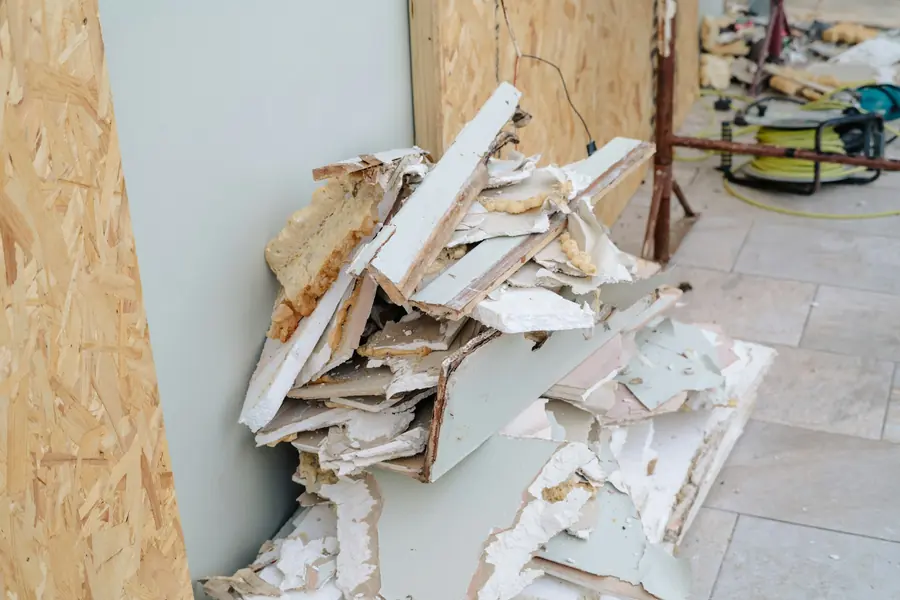 Pile of drywall and insulation from a home remodeling project